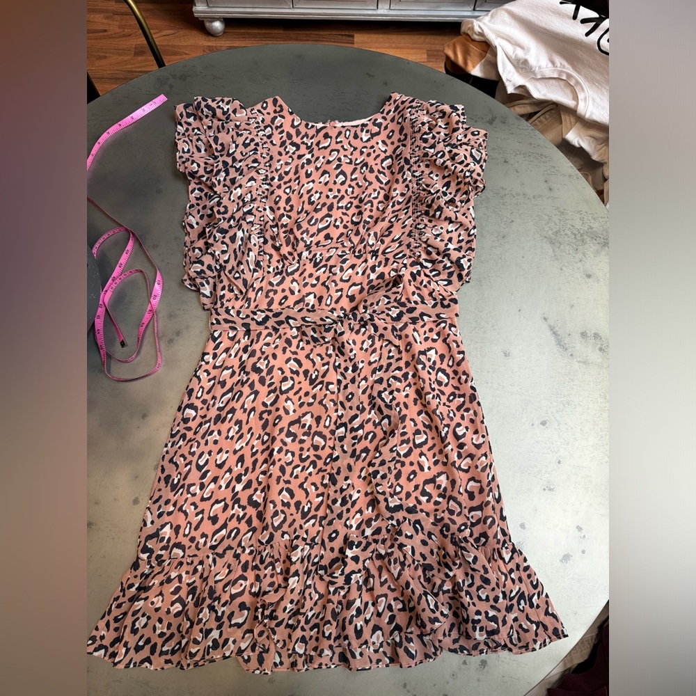 Sugar Lips leopard print ruffle sleeve dress.